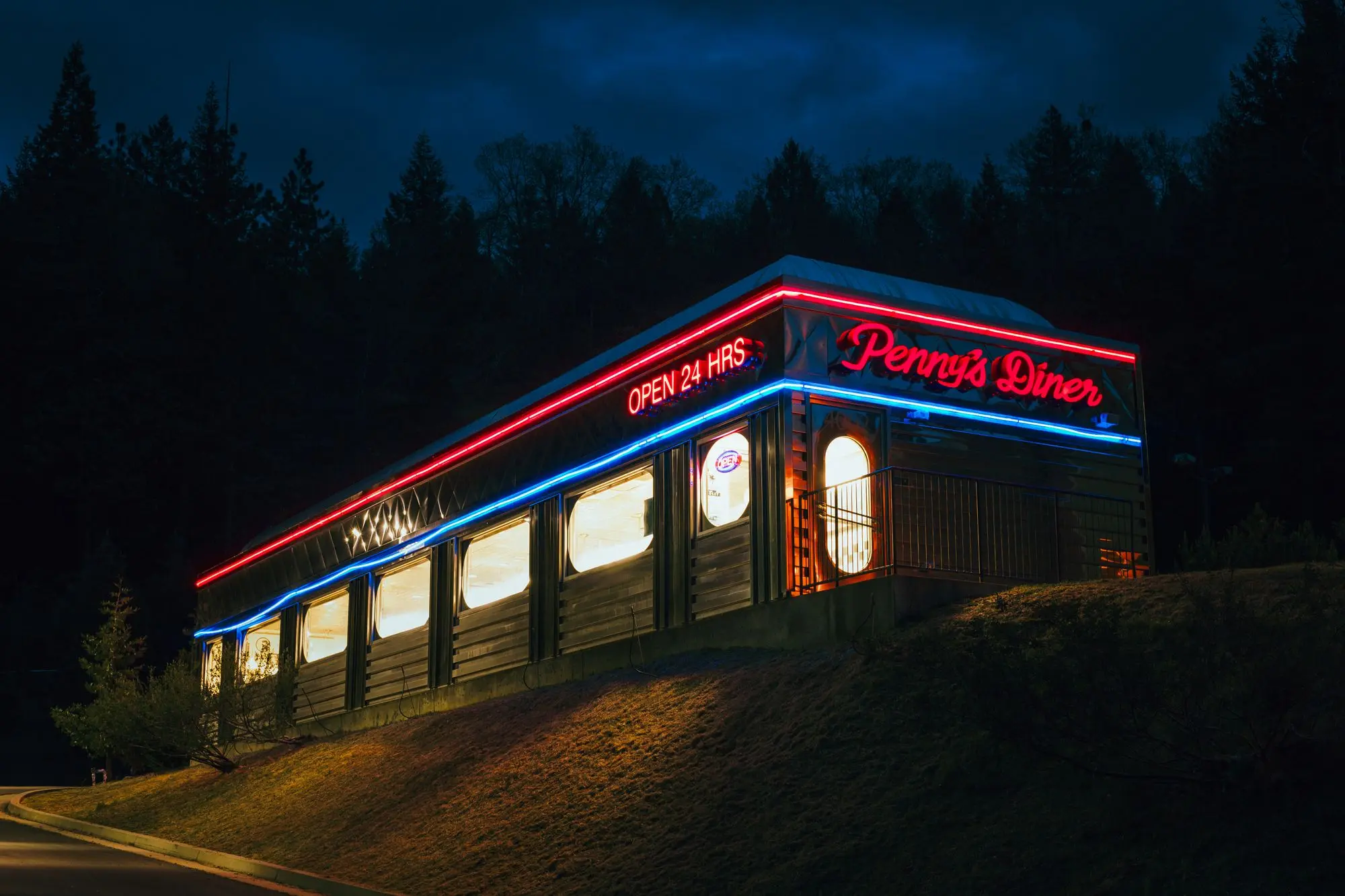 Diner with a neon sign at night