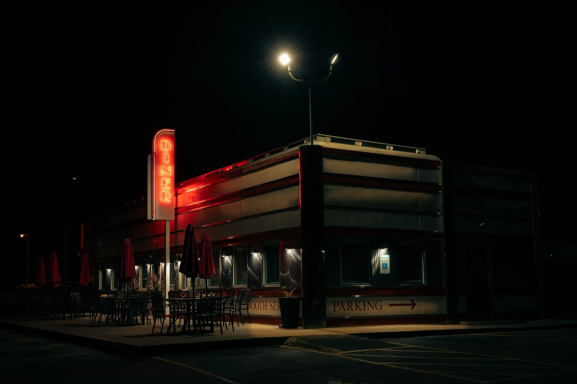 Diner exterior lit up at night